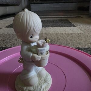 Precious Moments Figurine with Pink and Cream Accents